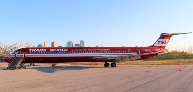 The red and white airplane is a reverse color scheme to the standard TWA airliners.