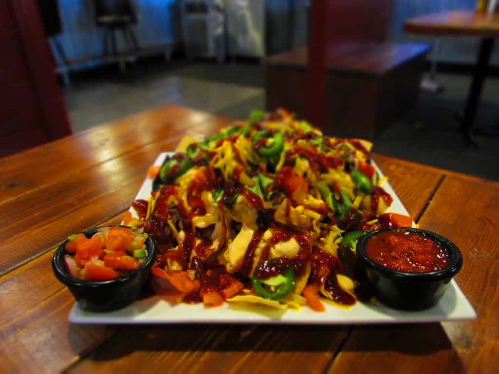 Pulled Pork Nachos are a heaping mound of flavor.
