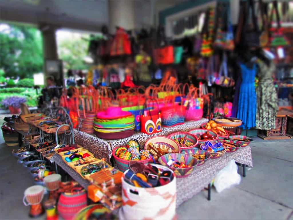 Brightly colored items are prominently displayed in the 5 blocks that make up the French Market in New Orleans.