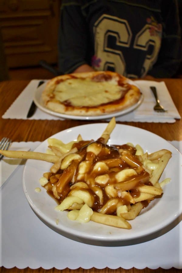 Poutine and pizza ere our dishes of choice during our first dinner in Old Quebec City.