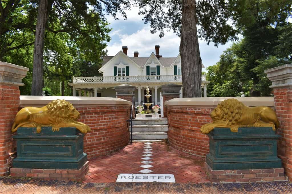 The entrance to the Koester House Museum is guarded by statues purchased at the worlds fair.