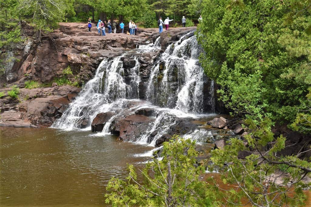 Visitors scramble among the rocks at Gooseberry falls, which is the gateway to the North Shores.